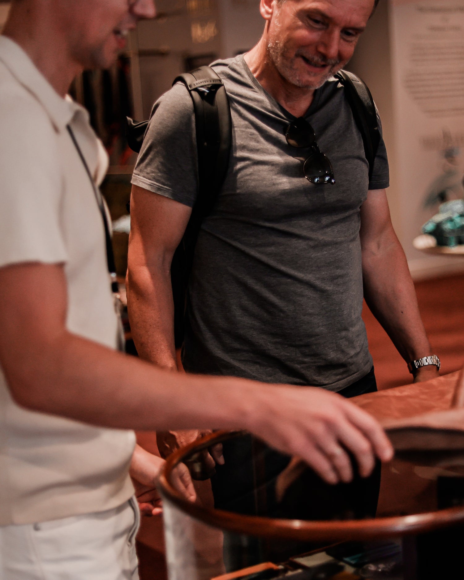 Corporate networking event featuring live art and luxury leather personalisation by Aivis Provejs